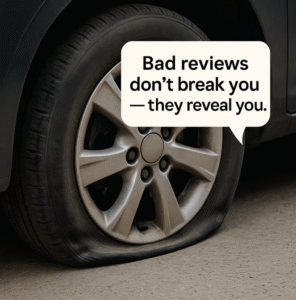 Flat tire image symbolizing how bad reviews can slow you down but also show your resilience.